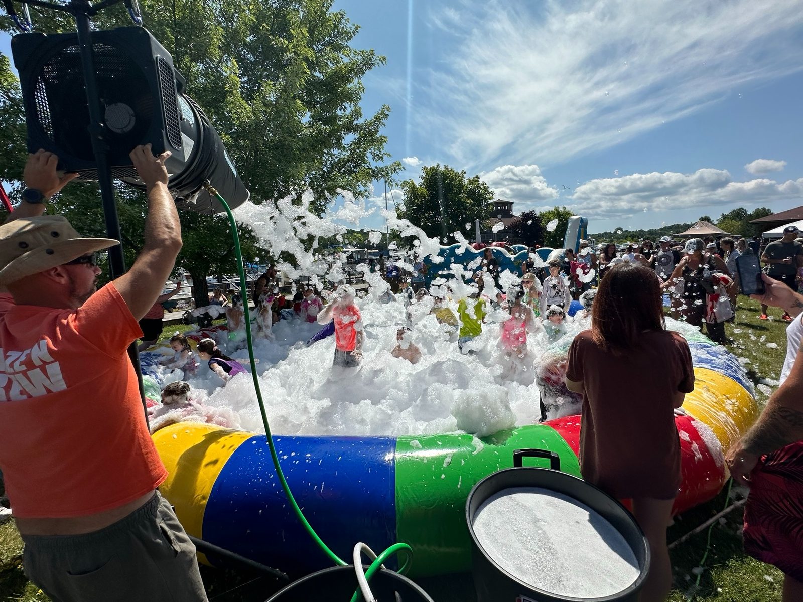 Foam party crowd at an A Maze N Fun event